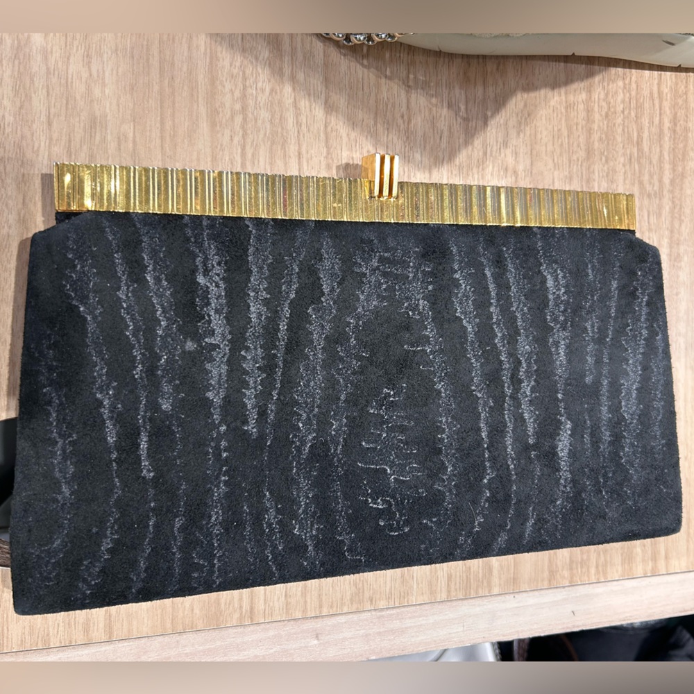 Jacomo Animal skin clutch Black Clutch with  Accents. Color Rare vintage